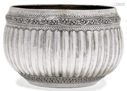 A RIBBED SILVER BOWL.