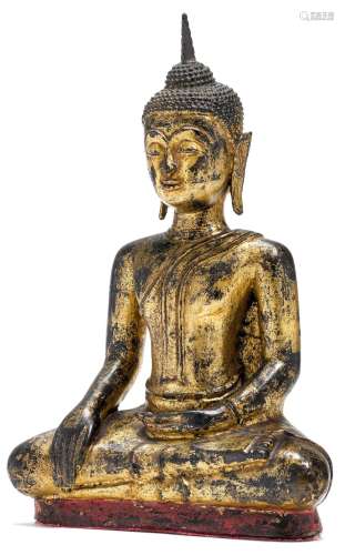 A GILT LACQUERED SEATED BRONZE BUDDHA.