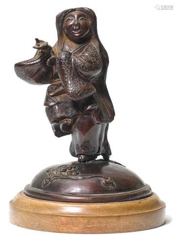 A BRONZE FIGURE OF DANCING SHOJO.