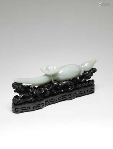 A LARGE PALE GREEN JADE 'LOTUS-ROOT' CARVING 18th century (2...