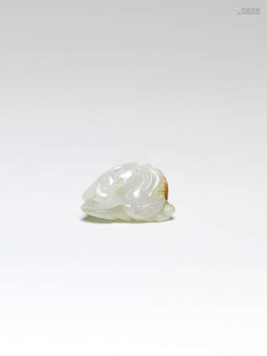A FINE SMALL WHITE AND RUSSET JADE 'QILIN, BAT AND COINS' GR...