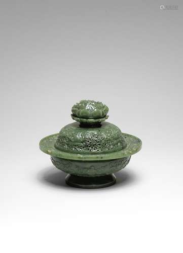 A FINE SPINACH-GREEN JADE 'EIGHT BUDDHIST EMBLEMS' OPENWORK ...