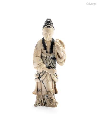 A SOAPSTONE CARVING OF A LADY 17th/18th century (2)