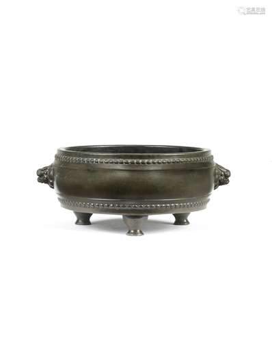 A BRONZE DRUM-SHAPED TRIPOD INCENSE BURNER Xuande six-charac...