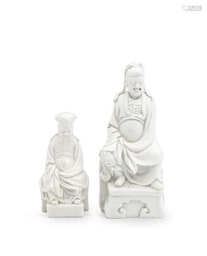 TWO BLANC-DE-CHINE SEATED FIGURES OF GUANDI AND TUDI SHEN Ka...