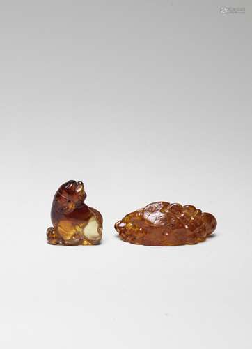 TWO AMBER ANIMAL CARVINGS (2)