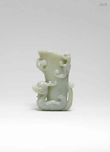 A PALE GREEN JADE 'DRAGON AND CHILONG' RHYTON CUP 17th centu...