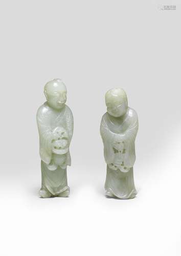 A PAIR OF PALE GREEN JADE FIGURES OF THE HEHE ERXIAN 17th ce...