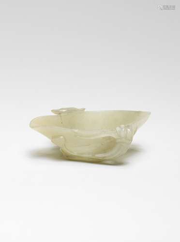 A PALE GREEN JADE 'LOTUS' CUP Ming Dynasty