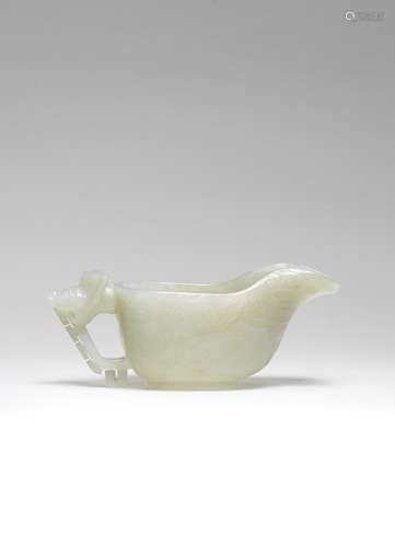 A RARE ARCHAISTIC PALE GREEN JADE POURING VESSEL, YI Ming Dy...