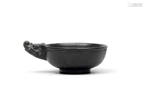 A RARE BLACK-GLAZED 'DRAGON' CUP Yuan Dynasty