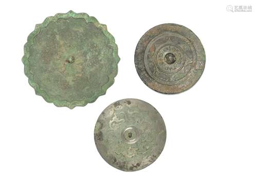 THREE BRONZE CIRCULAR MIRRORS (3)