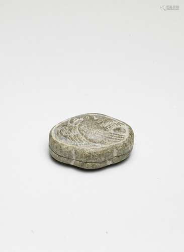 A RARE OLIVE-GREEN STEATITE COSMETIC BOX AND COVER Tang Dyna...