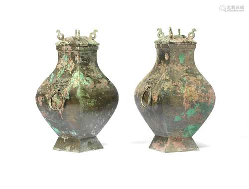 A PAIR OF ARCHAIC BRONZE SQUARE VASES AND COVERS, FANGHU Han...