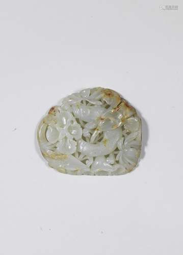 A RARE PALE GREEN AND RUSSET JADE 'LOTUS AND FISH' OPENWORK ...