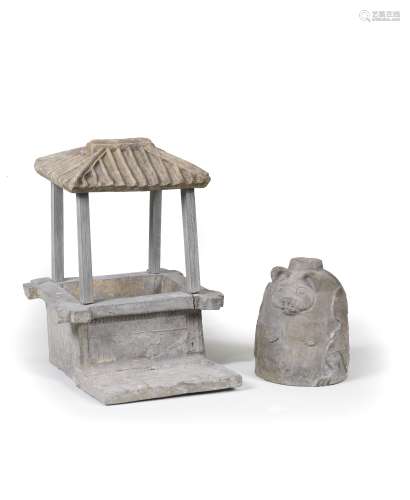 A GREY POTTERY MODEL OF A ROOFED WELLHEAD AND A GREY POTTERY...