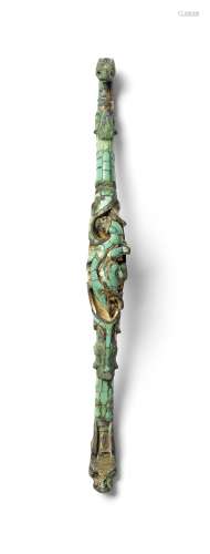 A rare turquoise-inlaid gilt-bronze belt hook Warring States...