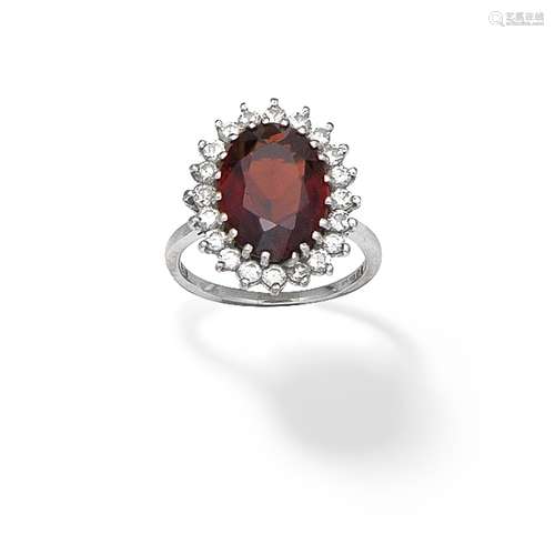 GARNET AND DIAMOND CLUSTER RING,