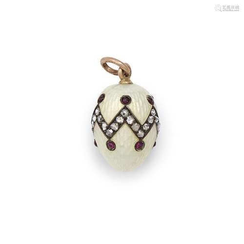 A jewelled gold-mounted enamel miniature egg pendantTillande...