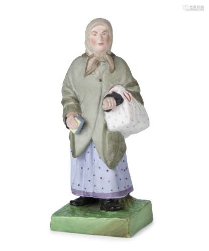 A porcelain figure of an old Jewish womanGardner Porcelain F...