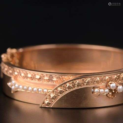 Bracelet jonc en or rose 18k bordé d'une frise feuillagée aj...