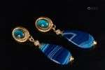 YVES SAINT LAURENT. Paire de boucles d'oreilles à clips en m...