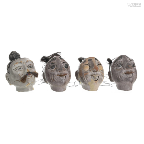 Four 'Bunraku' puppet heads