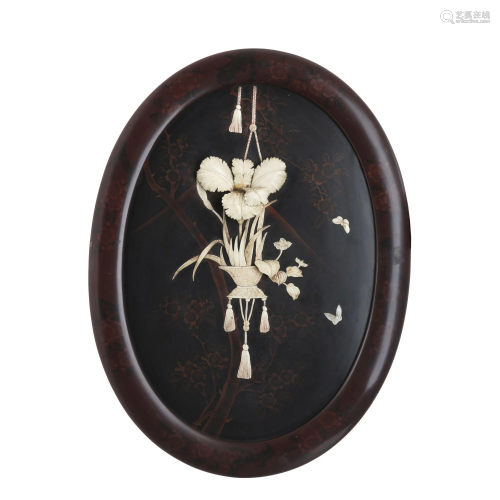 Oval floral plaque