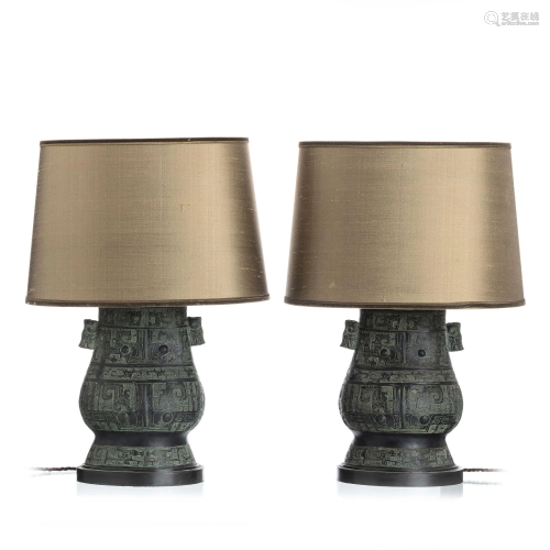 Pair of Chinese bronze archaic style lamps