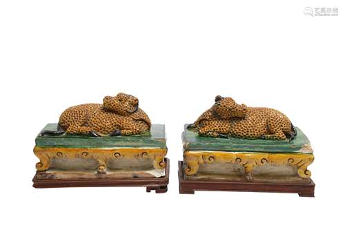 A PAIR OF CHINESE SANCAI 'RAMS' ROOF TILES.