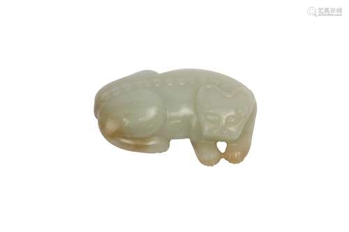 A CHINESE PALE CELADON JADE ARCHAISTIC MODEL OF A LION. / A ...