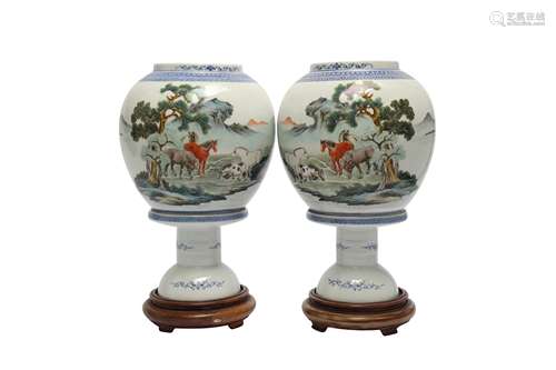 A PAIR OF FAMILLE ROSE 'EIGHT HORSE' LANTERNS.