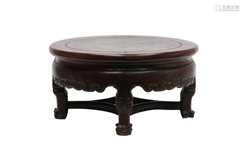 A CHINESE LOW CIRCULAR WOOD TABLE.