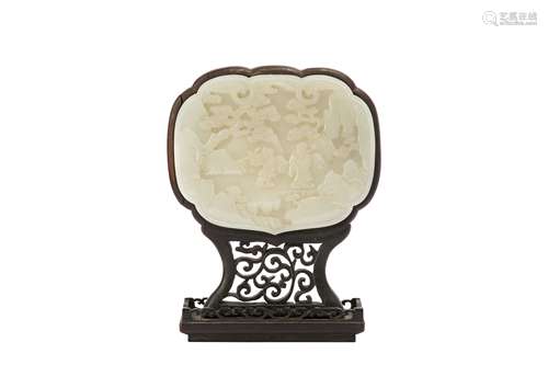 A CHINESE PALE CELADON JADE PLAQUE.