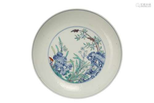 A CHINESE DOUCAI 'WILD ORCHIDS' DISH.