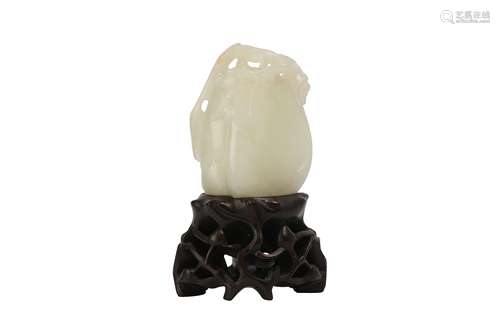 A CHINESE PALE CELADON JADE 'LOQUAT' CARVING.