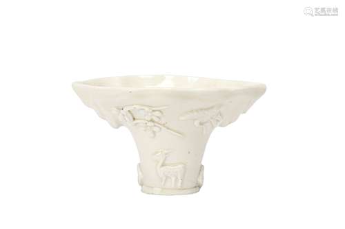 A CHINESE BLANC-DE-CHINE LIBATION CUP.