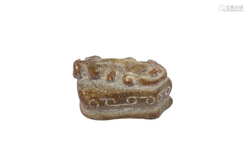 A CHINESE CELADON JADE 'CHILONG' TOGGLE.