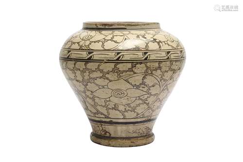 A CHINESE CIZHOU 'LOTUS SCROLL' JAR.