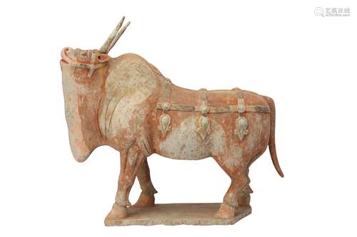 A CHINESE POTTERY MODEL OF AN OX.