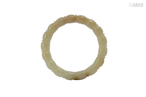 A CHINESE PALE CELADON JADE BANGLE.