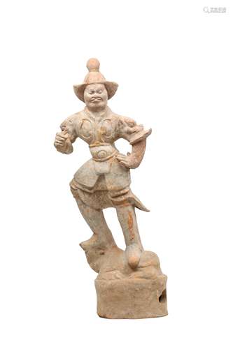 A CHINESE POTTERY FIGURE OF A LOKAPALA.