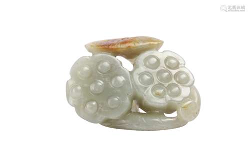 A CHINESE CELADON JADE 'LOTUS PODS' CARVING.