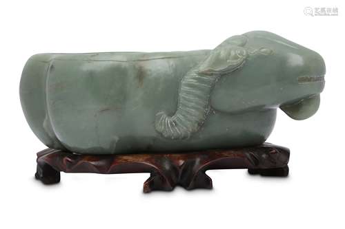 A CHINESE PALE CELADON JADE 'RAM' WASHER.