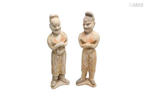 A PAIR OF CHINESE POTTERY GUARDIAN FIGURES.