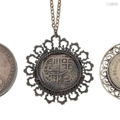 Three coin pendant necklaces, comprising: a pendant mounted ...