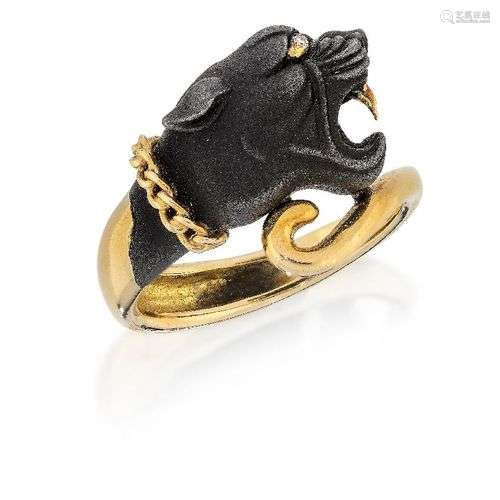 A diamond-set ring, of crossover design, the blackened front...