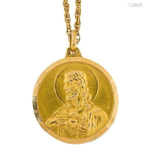 A 20th century religious medallion pendant and chain, the me...