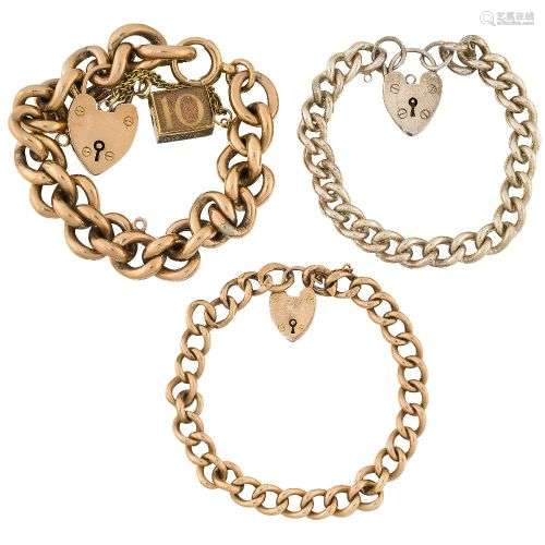 Two early 20th century gold curb link bracelets, the first w...