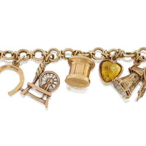 A charm bracelet, the fancy link chain suspending thirteen 9...